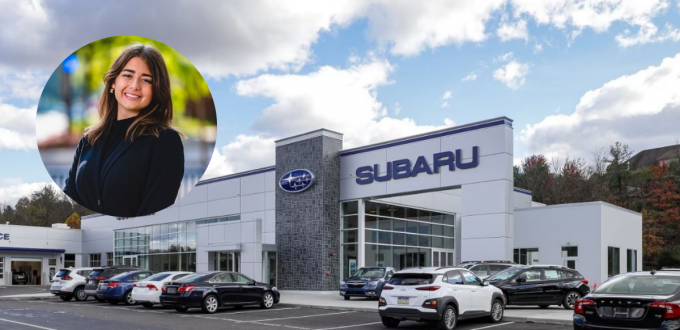 Grace Brignola in front of a Subaru dealership