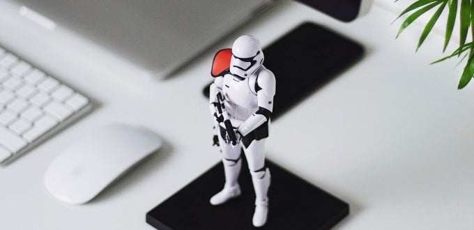 Storm trooper action figure on a home office desk