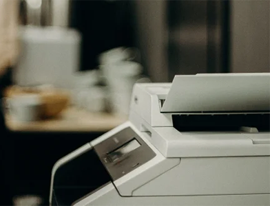 Man standing at printer